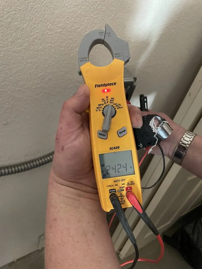 Voltage testing with clamp meter during Circuit Breaker Repair in Lancaster